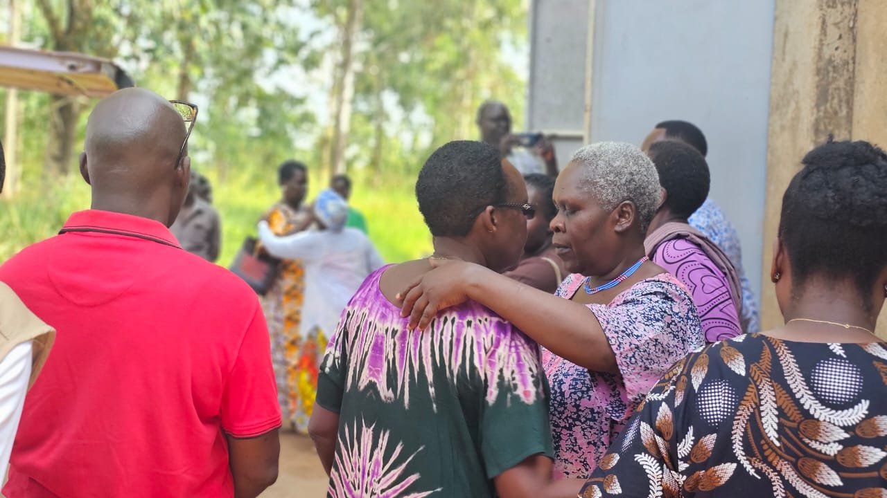 Family receiving Baba at the church entrance